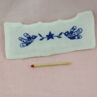 Miniature embroidered cover bed