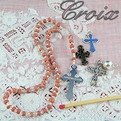 Cross, Rosary beads.